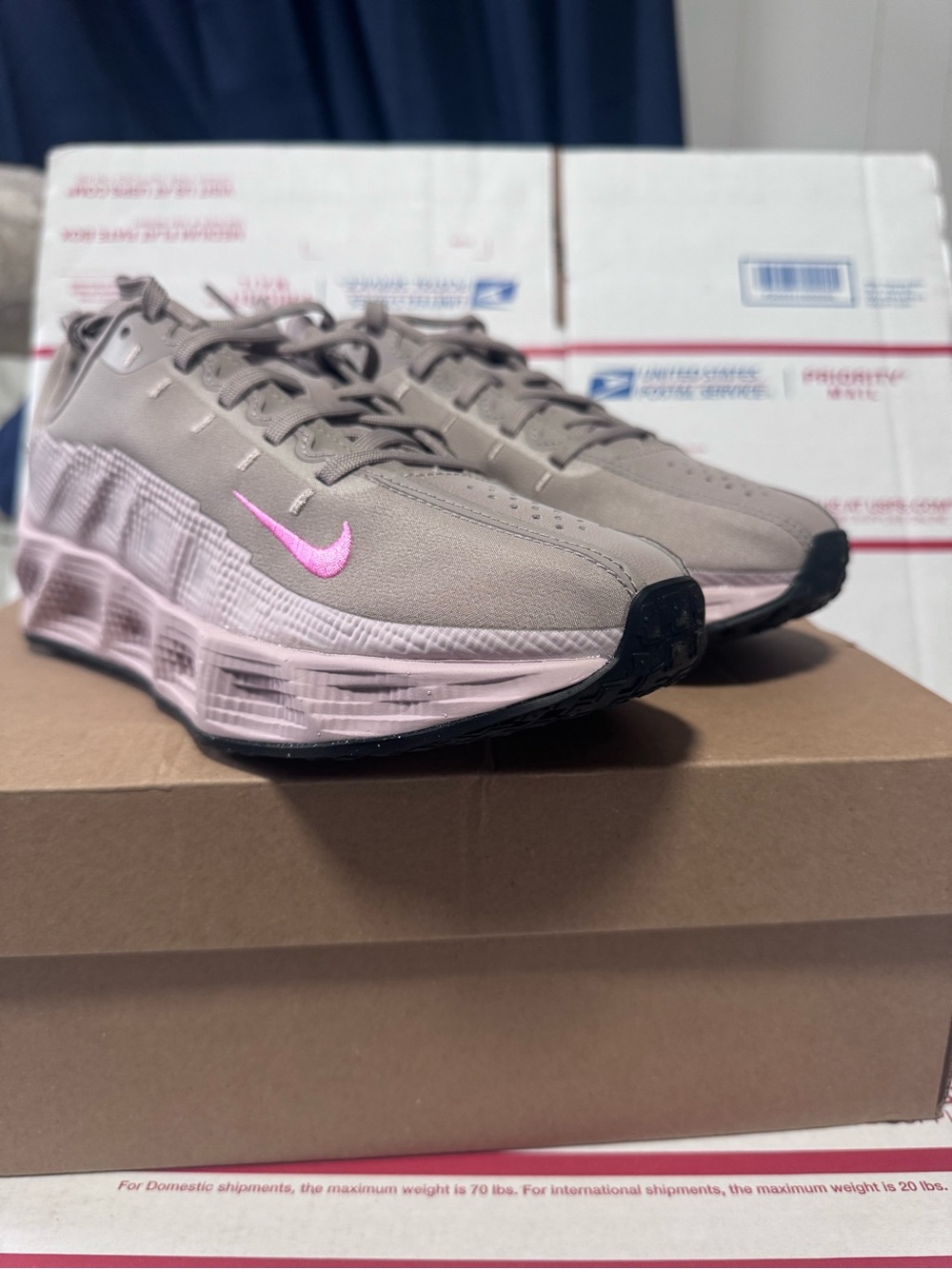 Nike Women's Taupe Sneakers with Pink Swoosh and Black Outsole